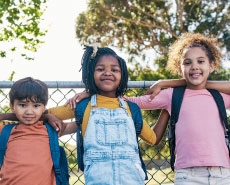 kids along a fence